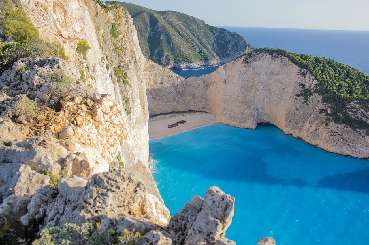 A bird's eye view of Navagio Beach in Greece.