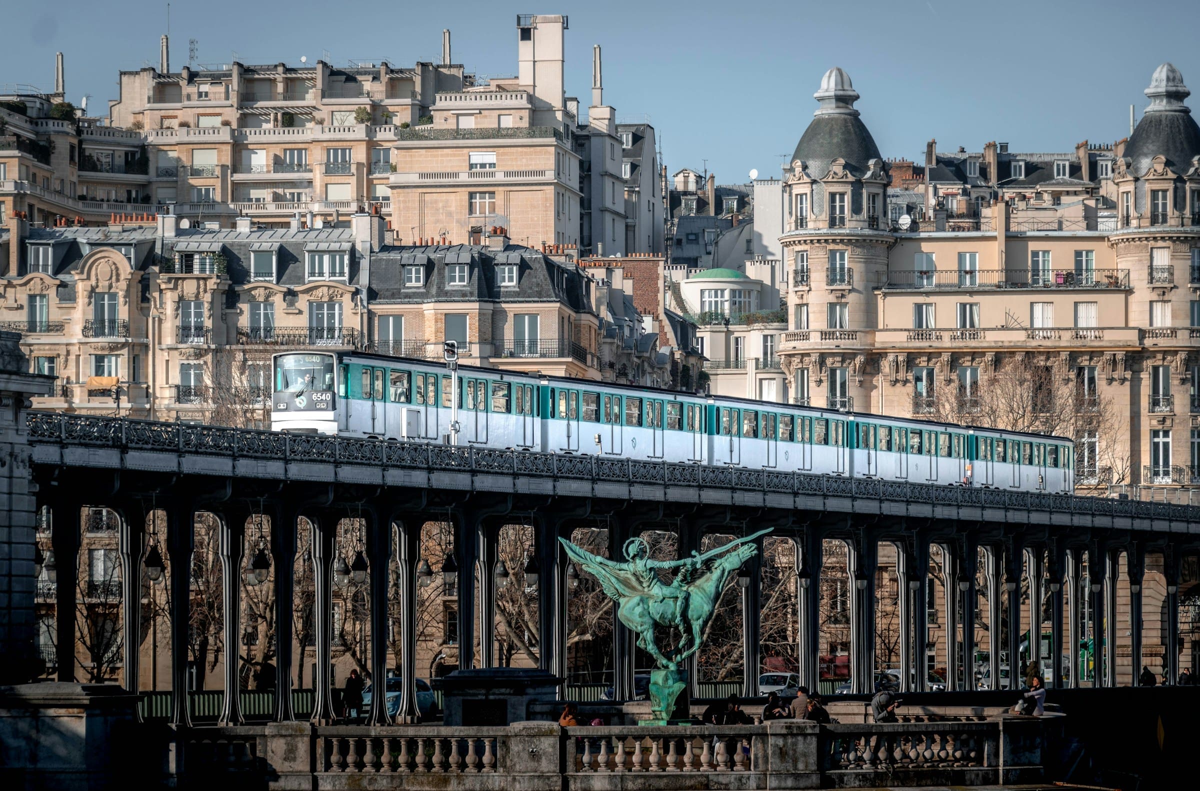 An image of an above ground train on the Paris Metro.