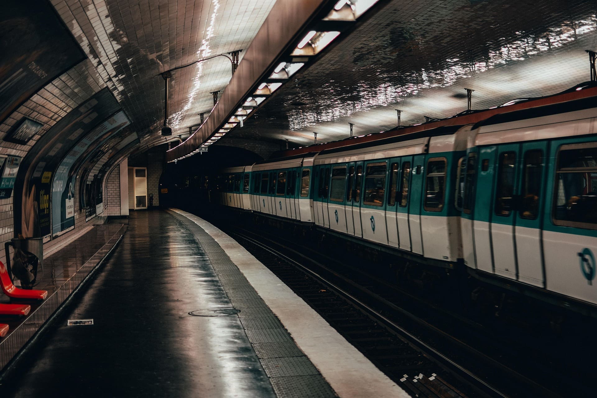 A dimly lit station on the Paris Metro.